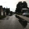 Foto: Martin Heitink | Putten overstromen in sommige straten van Dieren