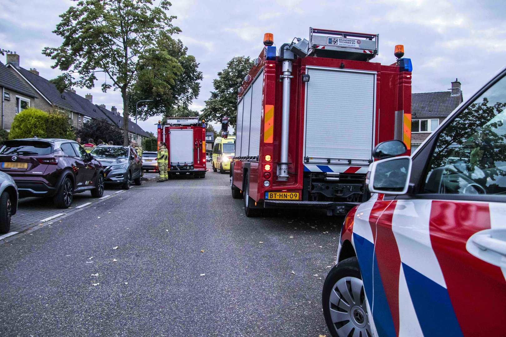 Vrouw bekneld tussen spijlen van de trap Rheden