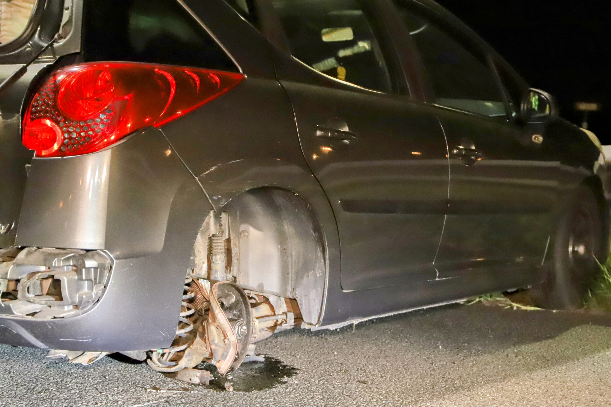 Wiel breekt af door ongeval, bestuurder aangehouden