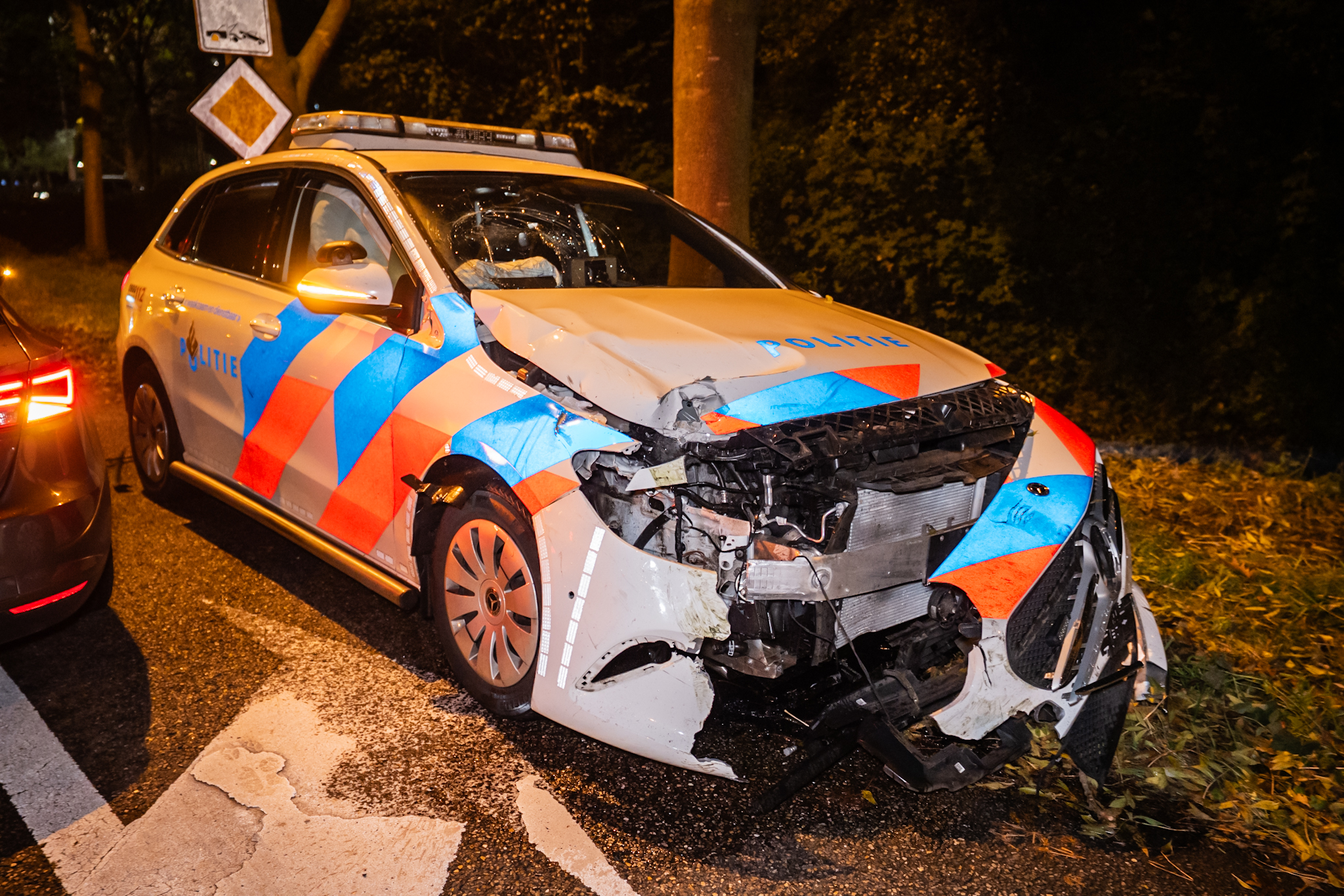 Ongeval met politiewagen op kruising