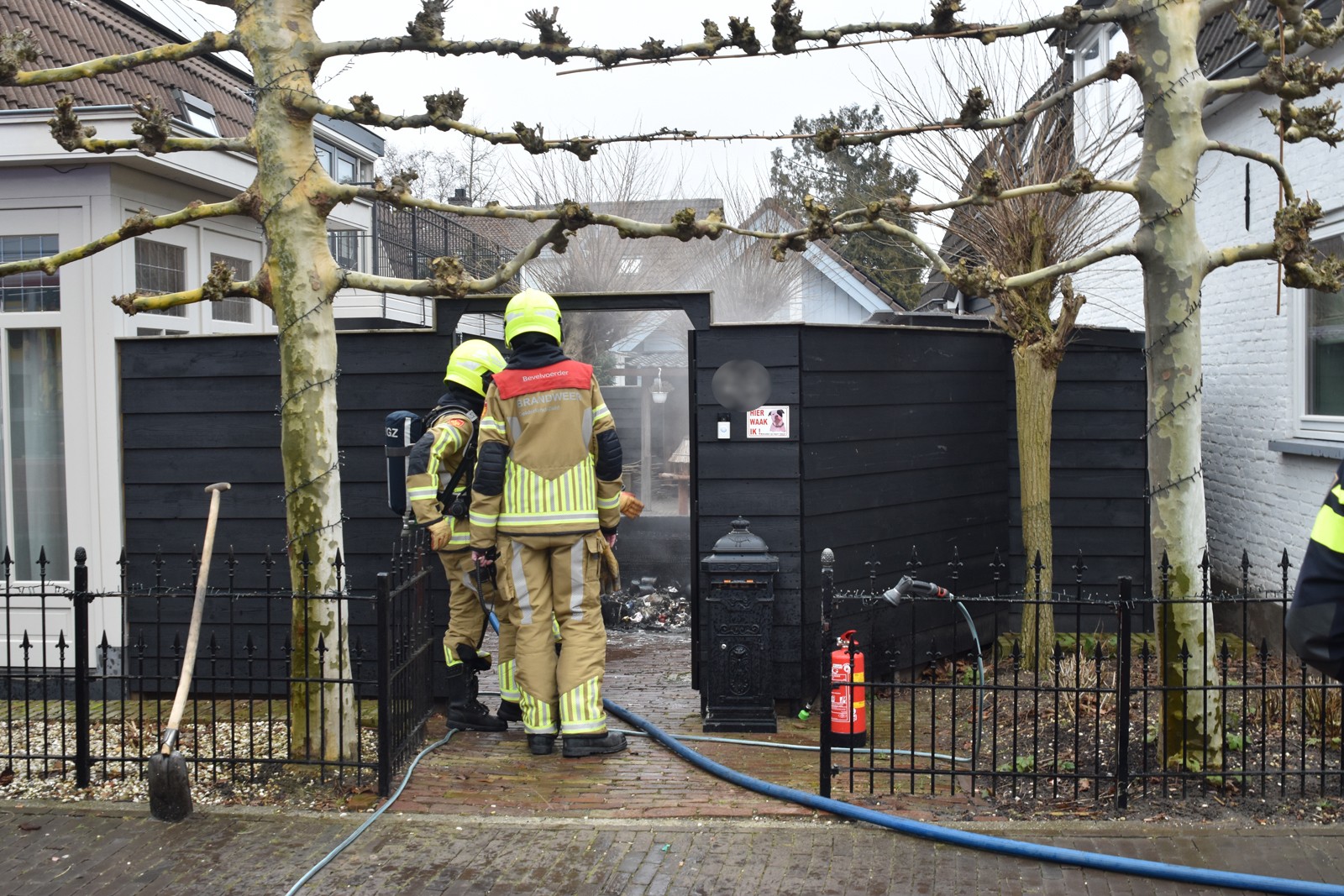 Buren voorkomen grotere schade bij containerbrand